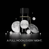 a bottle of full moon essential oil on a black background