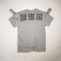 a grey t - shirt with a qr code on it