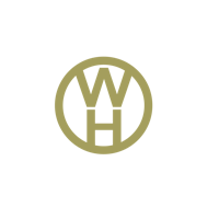a gold logo with the letter w in it