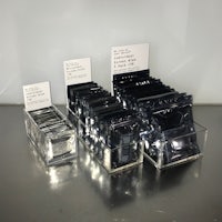 a set of clear plastic containers with labels on them
